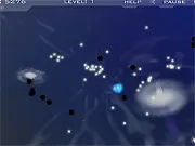 Ion Swarm free online strategy game - control blue glowing particles to defeat the black enemy