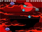 Chain Demon game screenshot showing a small demon character wielding a large spiked chainball weapon in a dark, infernal setting with platforms and enemies. Play free online action game.
