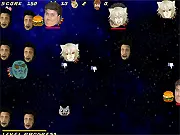 Gameplay screenshot of InterHate! showing a small spaceship firing multiple shells at large, meme-themed enemies in a free online arcade shooter game