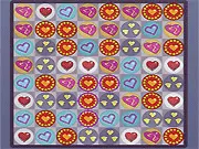Screenshot of Love Factory showing a grid of hearts and teddy bears in a sweet, romantic-themed Match 3 puzzle free online game