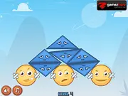 Build Balance 2 game screenshot showing various geometric shapes stacked precariously on a small platform against a blue background. Play the free online physics game.