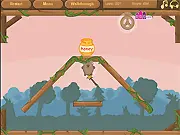 Sweet Honey Level Pack game screen showing a brown bear floating near a jar of honey, a free online physics puzzle game on PlayArcadeHub