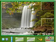 A completed sliding puzzle image showcasing a stunning waterfall and lush green nature scene from the Puzzle Craze game.