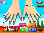 Sarah's Christmas Nail Art game screen showing a hand with nails decorated with festive designs like snowflakes, red polish, and green glitter.
