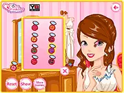 Screenshot of Elisa in the game Real Makeup for Prom, showcasing her completed elegant makeup, hairdo, and gorgeous dress
