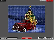 Screenshot of Christmas Truck Jigsaw puzzle showing scattered pieces around a large red delivery truck carrying Christmas presents in the snow. Play the free online timed puzzle.