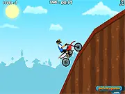 Biker Burnout game screen showing a dirt bike rider performing a mid-air flip over a large ramp