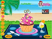Screenshot of Wedding Cup Cakes showing a beautifully decorated tier of cupcakes with white icing, pink ribbons, and decorative flowers. Play the free online game.