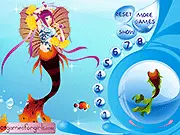 Amazing Mermaid Dressup game screenshot showing a young mermaid princess with long red hair and a sparkling tail