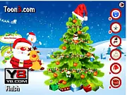 Screenshot of Christmas Tree Decorator free game showing a fully decorated pine tree with festive ornaments, lights, and a star topper