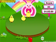 A punched Easter egg flying towards a target shaped like the Easter Bunny in the free online arcade game Easter Goal