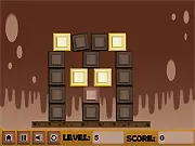 Chocolate Tower game screenshot, playing a free online physics puzzle, removing dark chocolate blocks to save the white chocolate