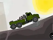 Free online simulation game screenshot of a large, rugged Russian KRAZ truck driving carefully across challenging, uneven terrain with a load of cargo.