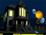 The Goblin House free online game screen, showing a pumpkin being thrown at an incoming green goblin.