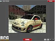 Fiat Jigsaw puzzle game screenshot showing an iconic Italian Fiat car image being assembled, with difficulty options visible, play free online.