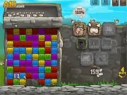 Screenshot of Tower Siege game showing the puzzle match-3 board at the bottom and the tower defense battlefield with enemy waves at the top. Play free online strategy game.